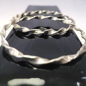 Pair of Silver Tone Twisted Ribbon Bangle Bracelets - 7.5cm - 2010
